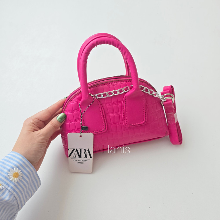 کیف دستی و دوشی زنانه سرخابی مدل نیمدایره طرح کروکودیل